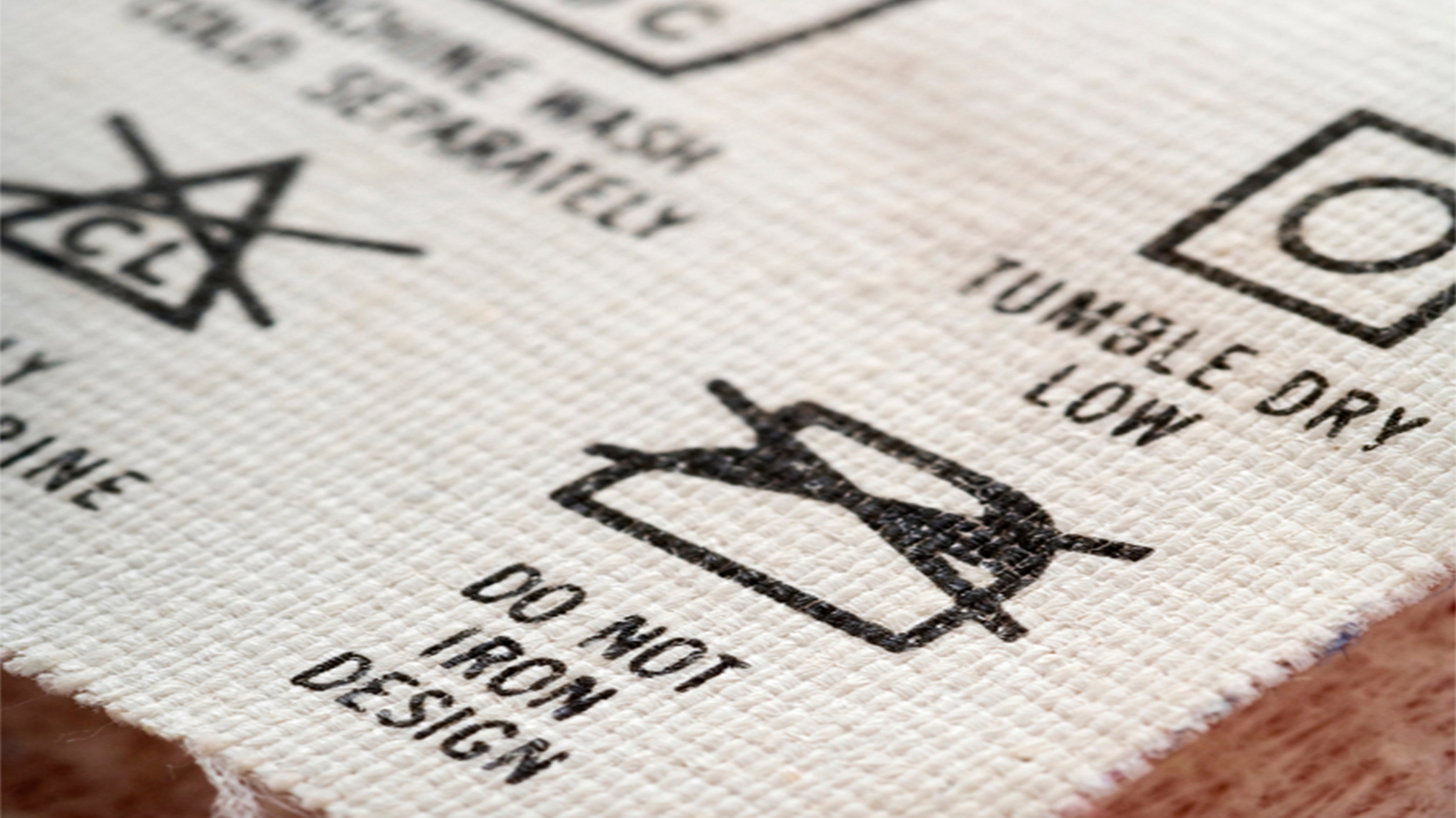 Relever le défi de l’étiquette d’entretien : une révélation en matière de lessive